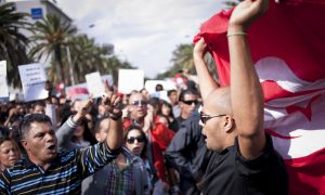 Tunisians demonstrate for peace, freedom of speech and for a secular state.